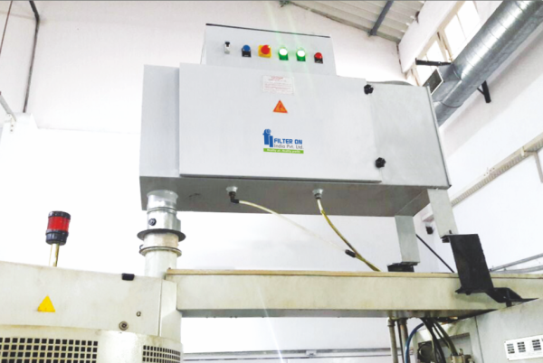 Fume extraction systems for ball point tips making machines
